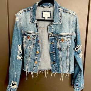 Distressed denim jacket